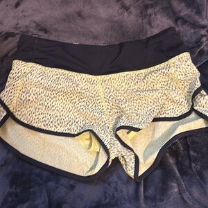 Lululemon running shorts size 4 yellow and black splatter pattern